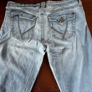 Vanity jeans missing button on back pocket